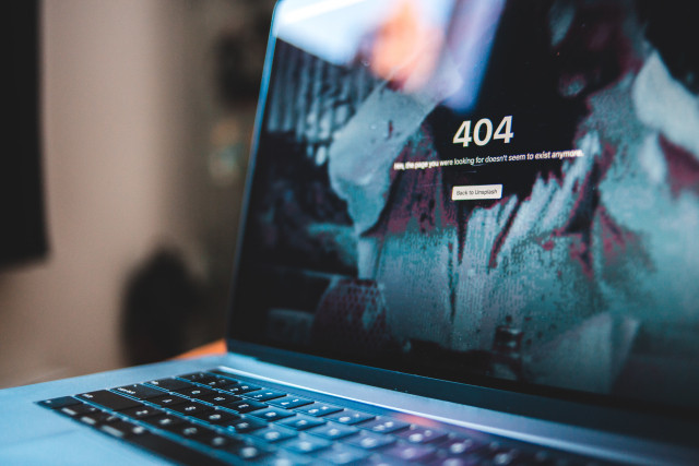 A laptop showing a 404